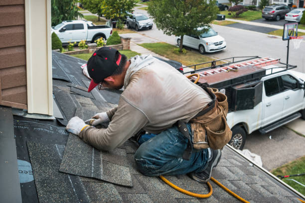 Professional Roof Replacement technician working in Elmora, PA